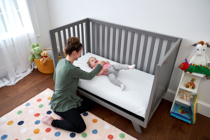 The Lullaby Earth Healthy Support Crib Mattress by Naturepedic ensures a safe, non-toxic, and supremely comfortable sleeping environment for your little one, from infancy through toddlerhood! 