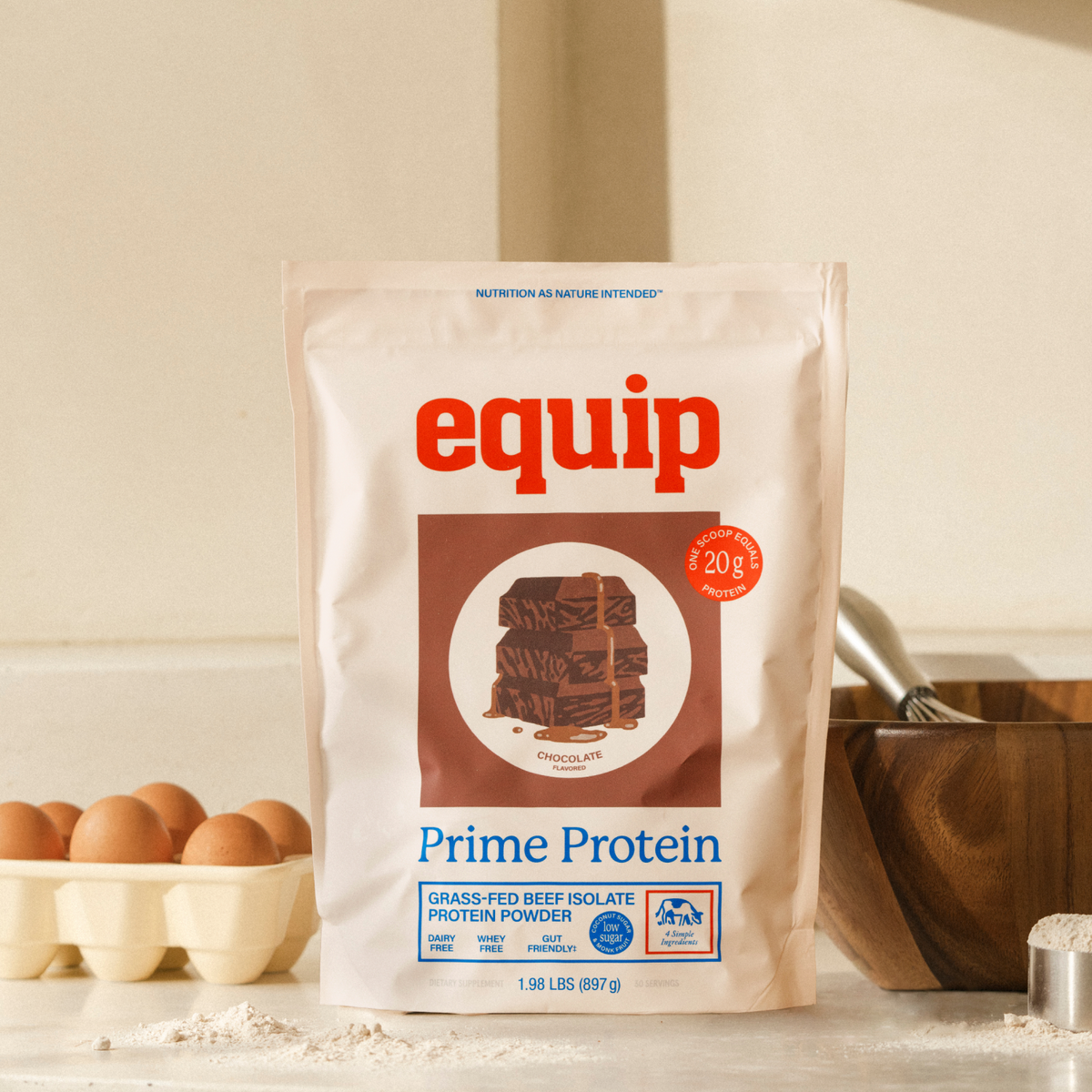 Equip Prime Protein low-sugar chocolate bag with chocolate pieces and a protein drink