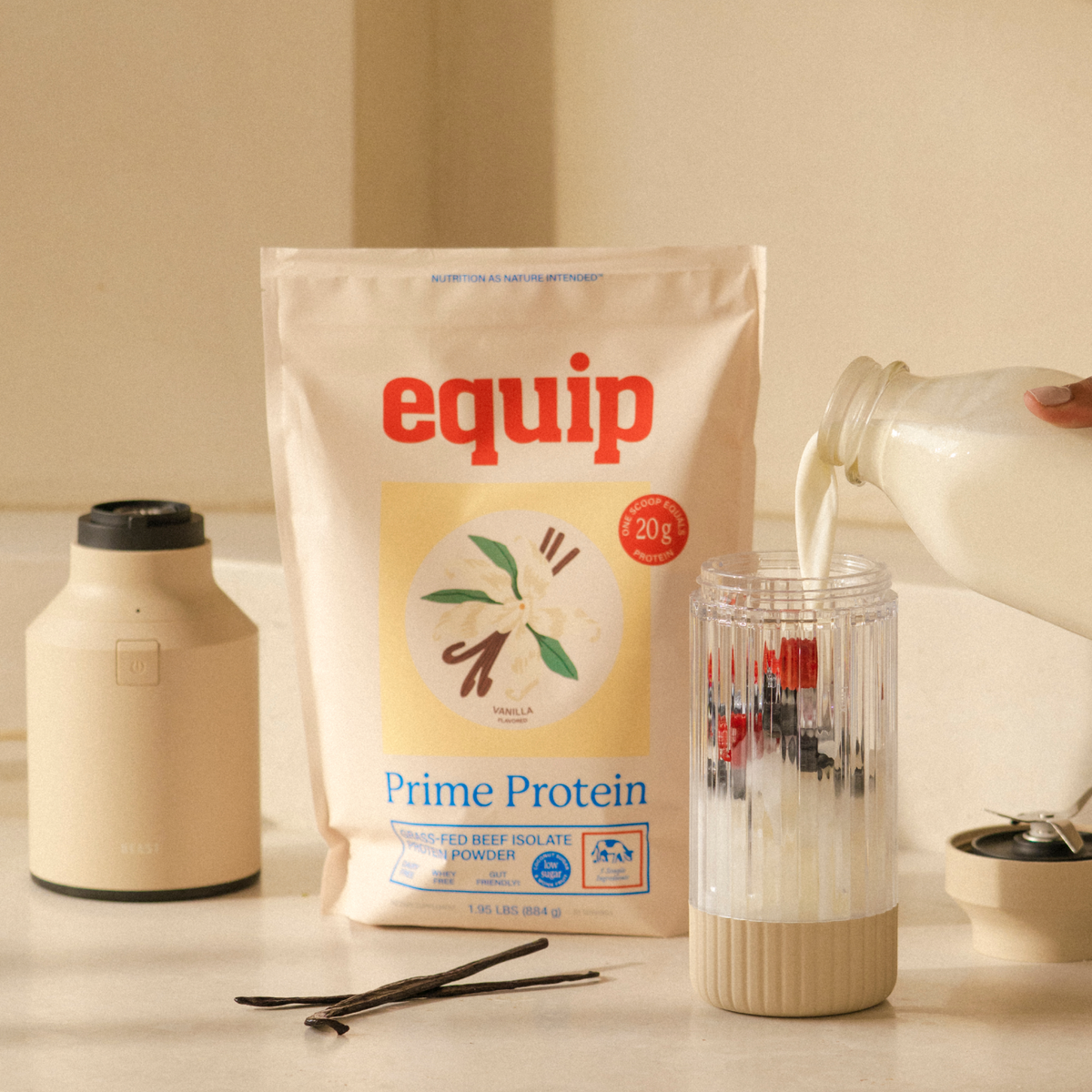 Equip Prime Protein low-sugar vanilla bag with vanilla flowers and a protein drink